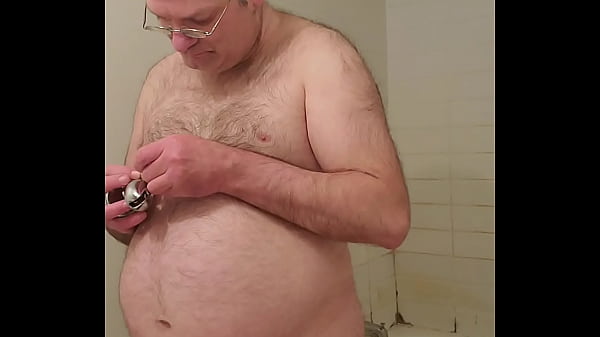 Nude Martin Lavall&eacute_e locks his own penis in a steel cage